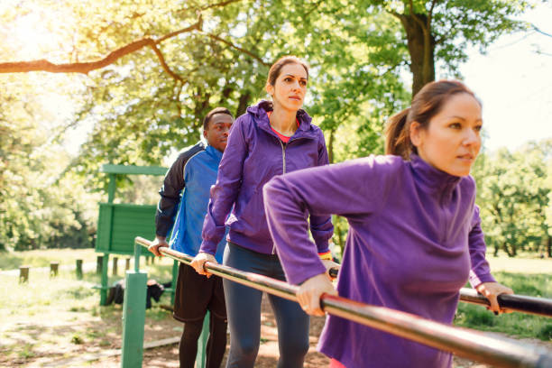 istock Friends training in park together 654792452