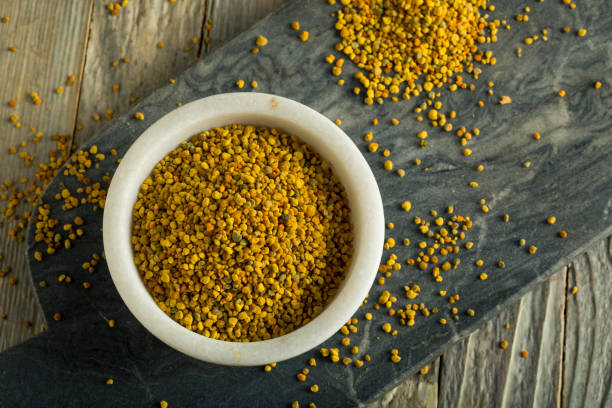 Raw Organic Yellow Bee Pollen Raw Organic Yellow Bee Pollen for Good Health pollen stock pictures, royalty-free photos & images