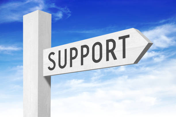 istock Support - white wooden signpost with one arrow 654795370