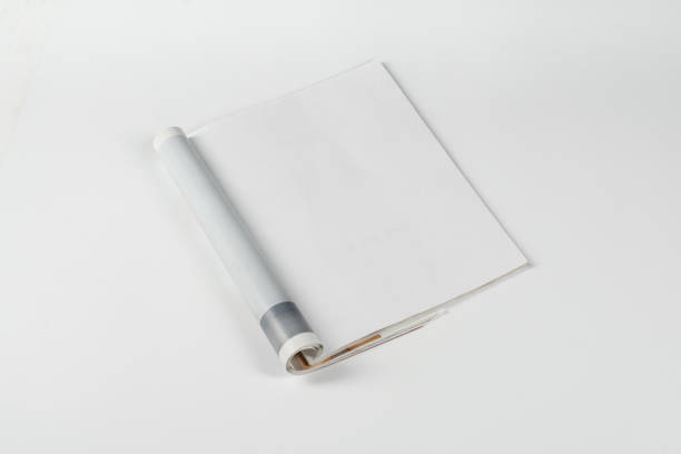 Mock-up magazines or catalog on white table background.