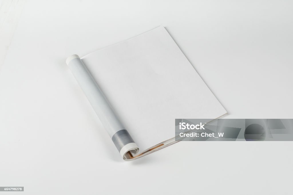 Mock-up magazines or catalog on white table background. Mock-up magazine or catalog on white table. Blank page or notepad on neutral background. Blank page or notepad for mockups or simulations. Magazine - Publication Stock Photo