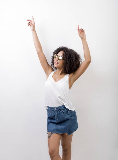 istock Happy brunette wearing sunglasses, looking away 654809556