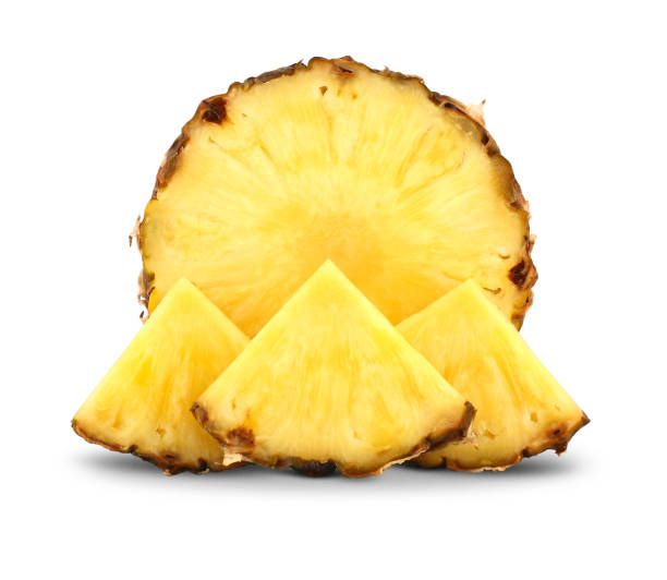 istock Cut pineapple with slices isolated on white background 654813016