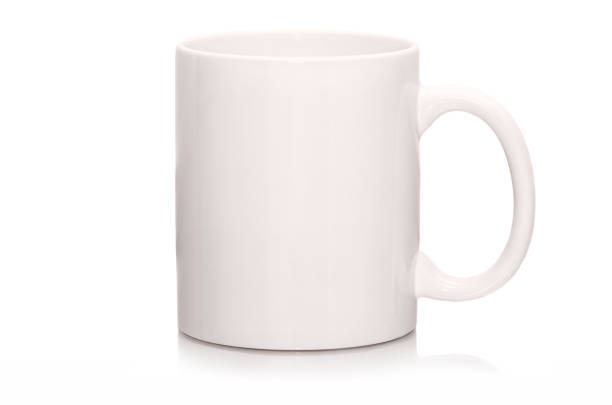 istock White mug empty blank for coffee or tea isolated on white background. Corporate identity blank white mug mockup. 654826504
