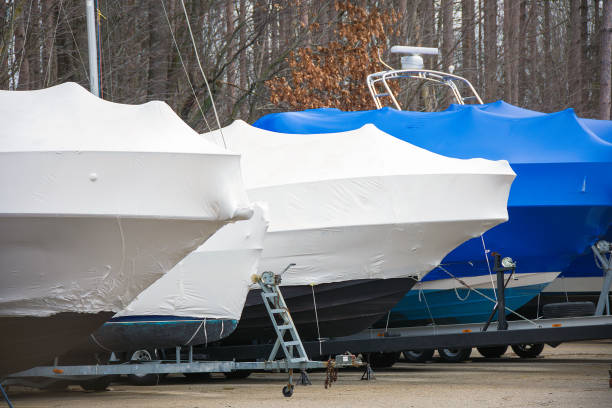 shrink wrapped boats stock photo