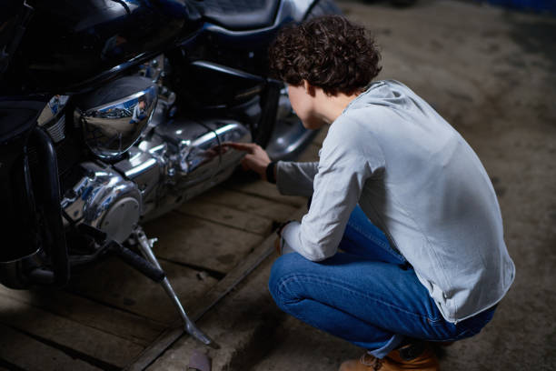 istock Woman with motorbike 654833752