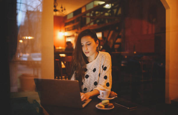 istock Young woman working in the Belgrade cafe 654842630