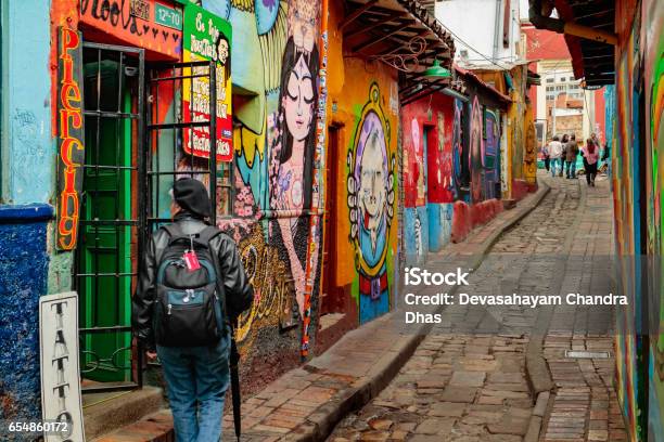 Bogota Colombia Tourists And Local Colombians On The Calle Del Embudo In The Historic La Candelaria District Of The Andean Capital City Stock Photo - Download Image Now