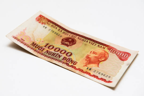 istock Vietnam Dong banknote on background 654860382
