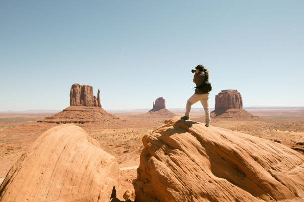 istock Photographer on the Monument Valley 654865246