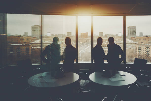 istock Two young businessman on private work meeting 654878766