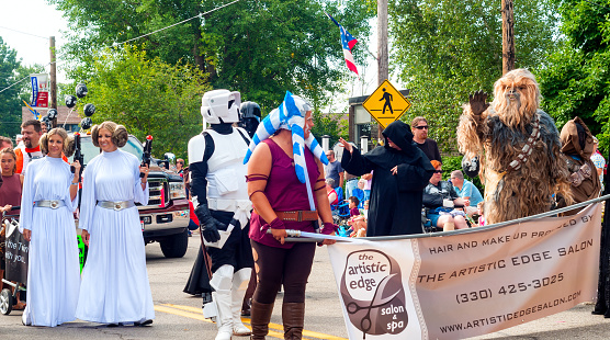 TWINSBURG, OH, USA - AUGUST 8, 2015: Twins and others dressed as characters from Star Wars walk in the Double Take Parade, part of the 40th annual Twins Day festival, the largest gathering of twins in the world.