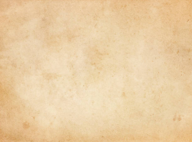 istock Aged and yellowed paper texture or background. 654885660