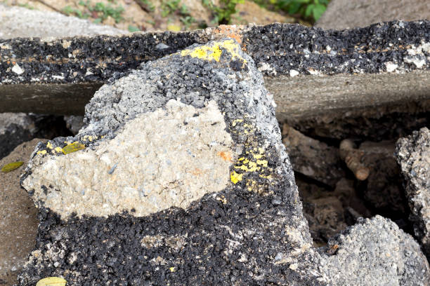 istock Old cracked asphalt road scrap heap damage 654889054