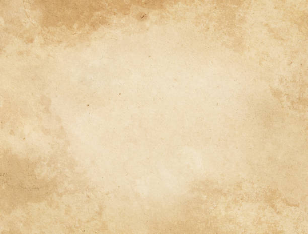 istock Old stained and yellowed paper texture. 654920578