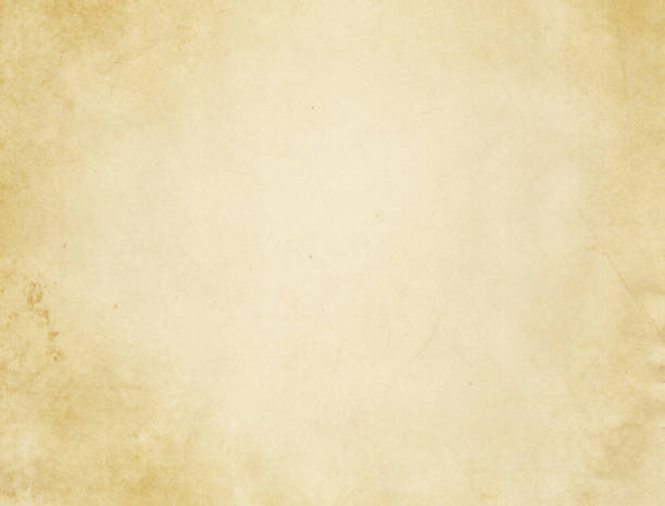 istock Old yellowed and stained paper texture. 654920588