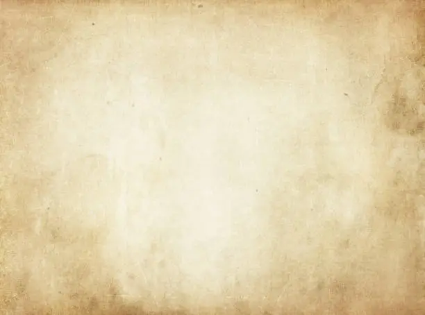 Photo of Old yellowed stained paper texture.