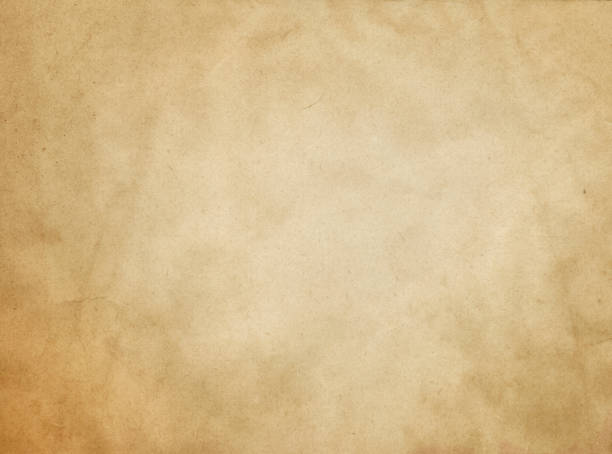 istock Old yellowed paper texture or background. 654925216