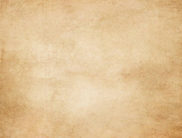 istock Old yellowed and stained paper texture. 654925288