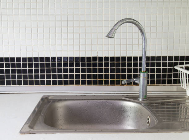istock Kitchen interior with sink and faucet 654925390