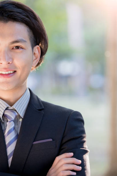 istock businessman smile to you 654931552