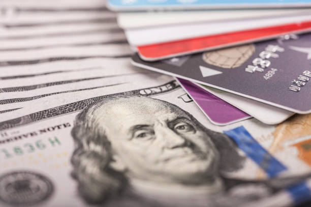 istock Credit cards on dollars 654936690