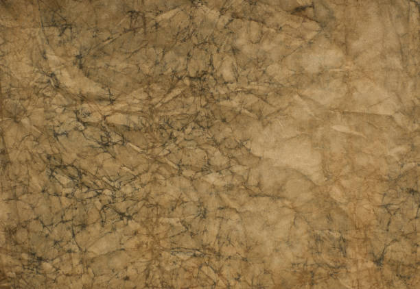 Abstract vintage  wrinkled textured brown paper background for text or image.