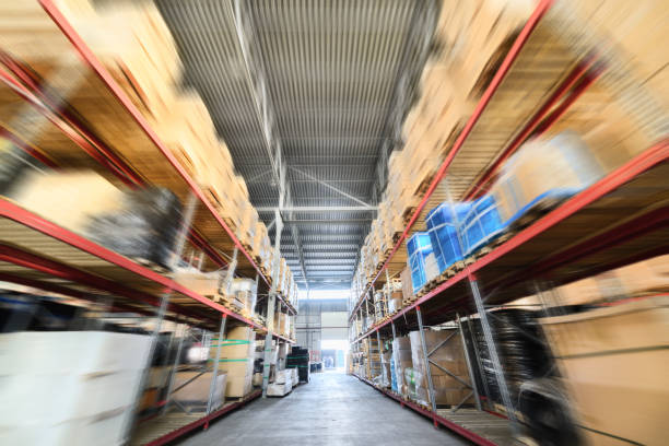 istock Long shelves with a variety of boxes and containers 654939704