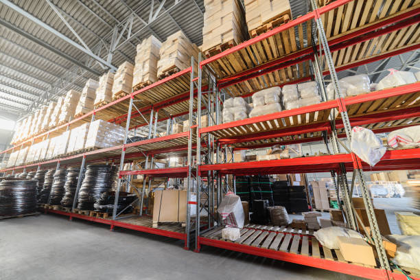 istock Long shelves with a variety of boxes and containers 654939884