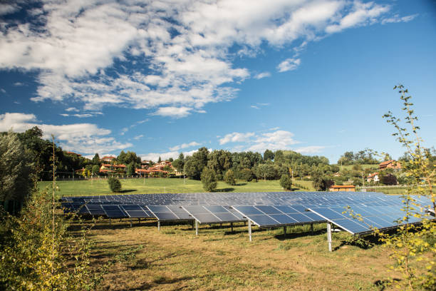 istock solar panel electricity central field in sunny day with blue sky and clouds 654939896