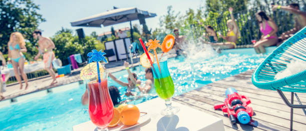 istock Defocused shot of a pool party 654942626