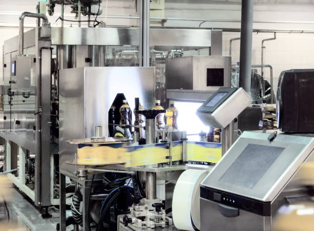 istock The filling machine pours beer into plastic PET bottles 654942882