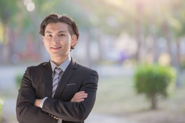 istock businessman smile to you 654949928