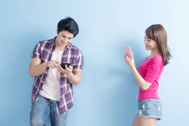 istock young couple use phone 654950190