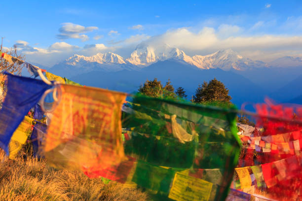 istock Himalaya mountain range with prayer flags, view from Poonhill, famous trekking destination in Nepal. 654956410