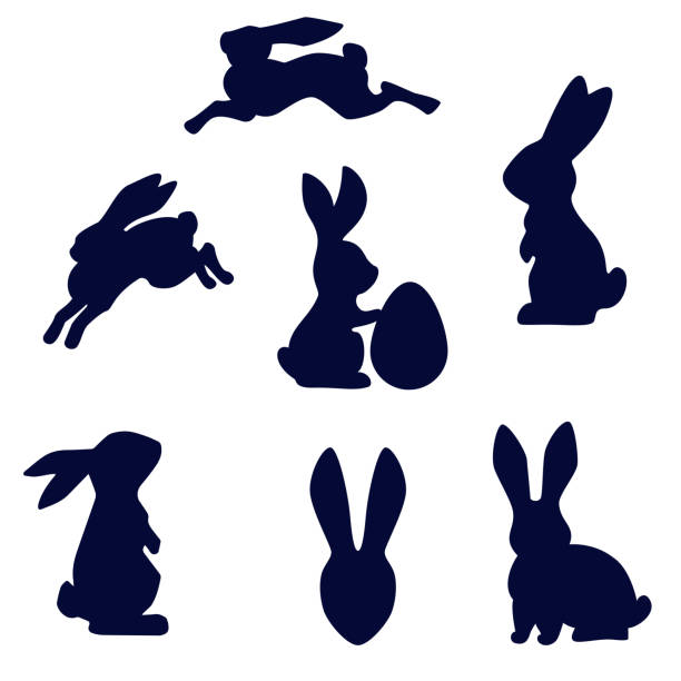 Easter rabbit black silhouette vector isolated on white background Easter running, looking up and standing with egg rabbits black silhouette. Set of Easter bunny outlines isolated on white background. easter silhouettes stock illustrations