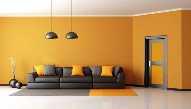 istock Black and orange living room 654957068