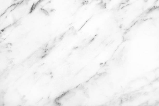istock White Carrara Marble natural light surface for bathroom  kitchen countertop 654967344