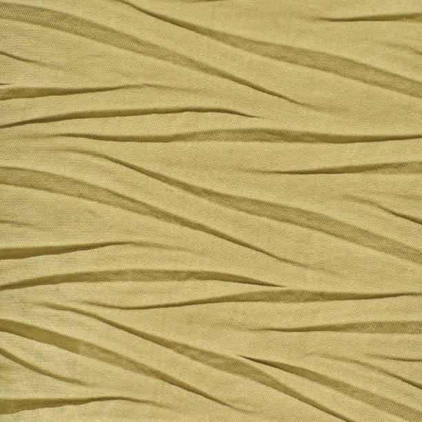 istock Yellow Golden Crumpled Synthetic textile 654968256