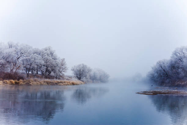 River at fall misty morning stock photo