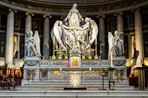 Paris, France - April 18, 2013: Interior and architectural details of Eglise de la Madeleine in Paris as seen on 18th of April, 2013. Church was designed in its present form as a temple to the glory of Napoleon's army.