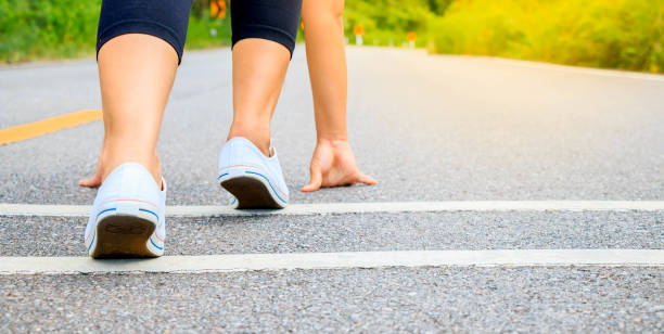 istock Girl starting running on the road 655015148
