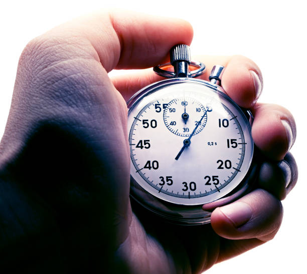 istock Male hand holding stopwatch 655022664