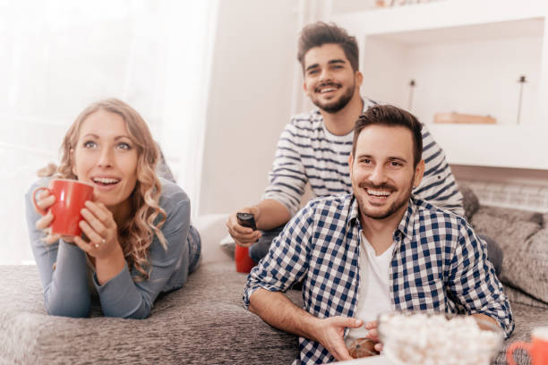 istock Cheerful group of friends having fun at home 655027074