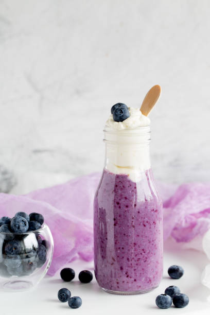 istock Glass of blueberry smoothie 655041634