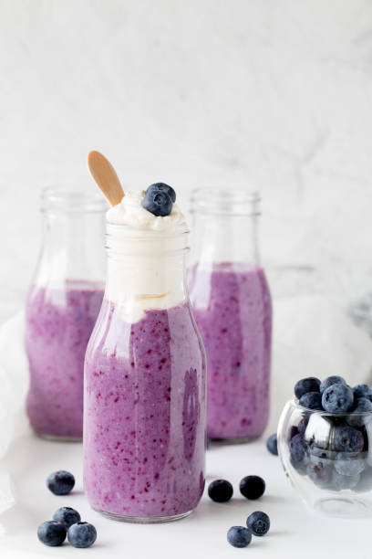 istock Glass of blueberry smoothie 655041674