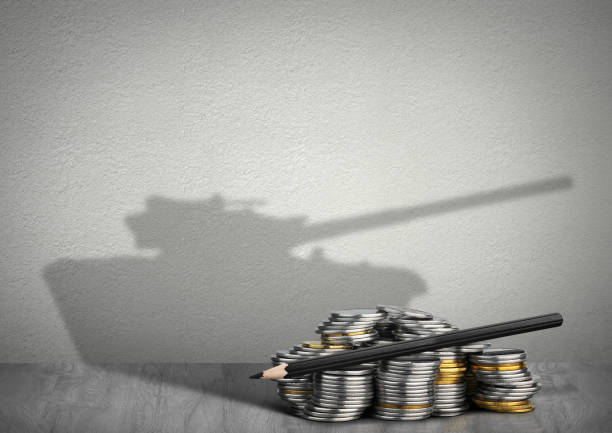 financing war concept, money with tank shadow financing war concept, money with tank shadow terrorist financing stock pictures, royalty-free photos & images