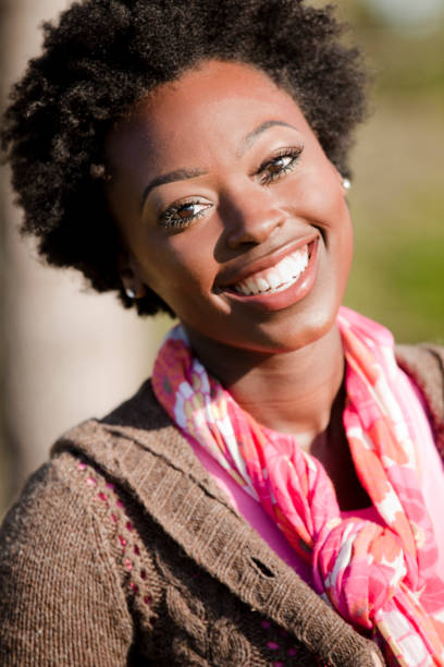 istock One African descent woman outdoors in park. 655045200