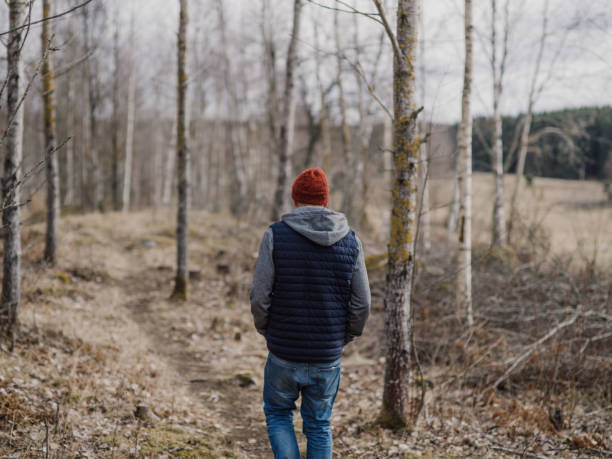istock Man in the woods nature in spring 655049354