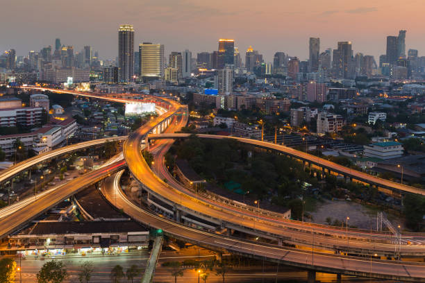 istock Aerial view Highway interchanged and city downtown 655050532